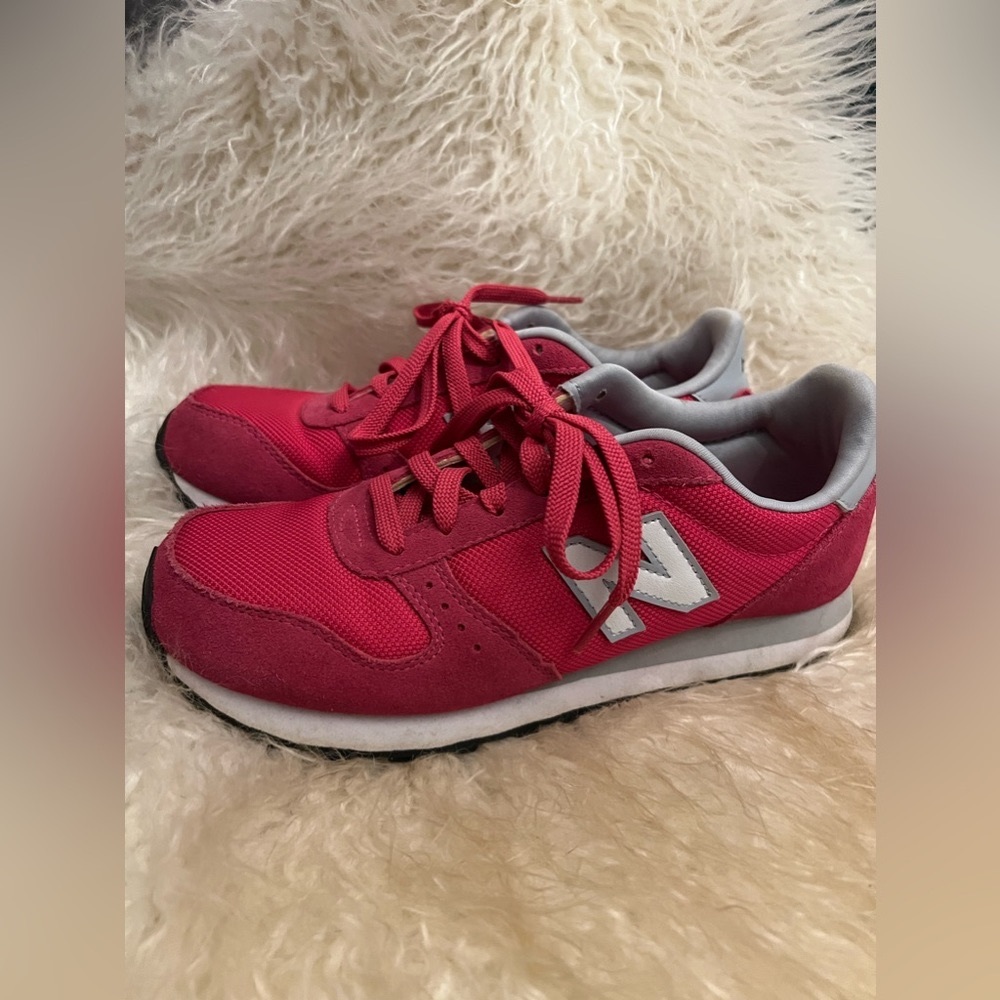Magenta New Balance shoes